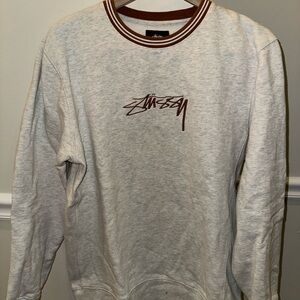 Stussy Men's Grey Crewneck Sweater with Copper Brown Accents